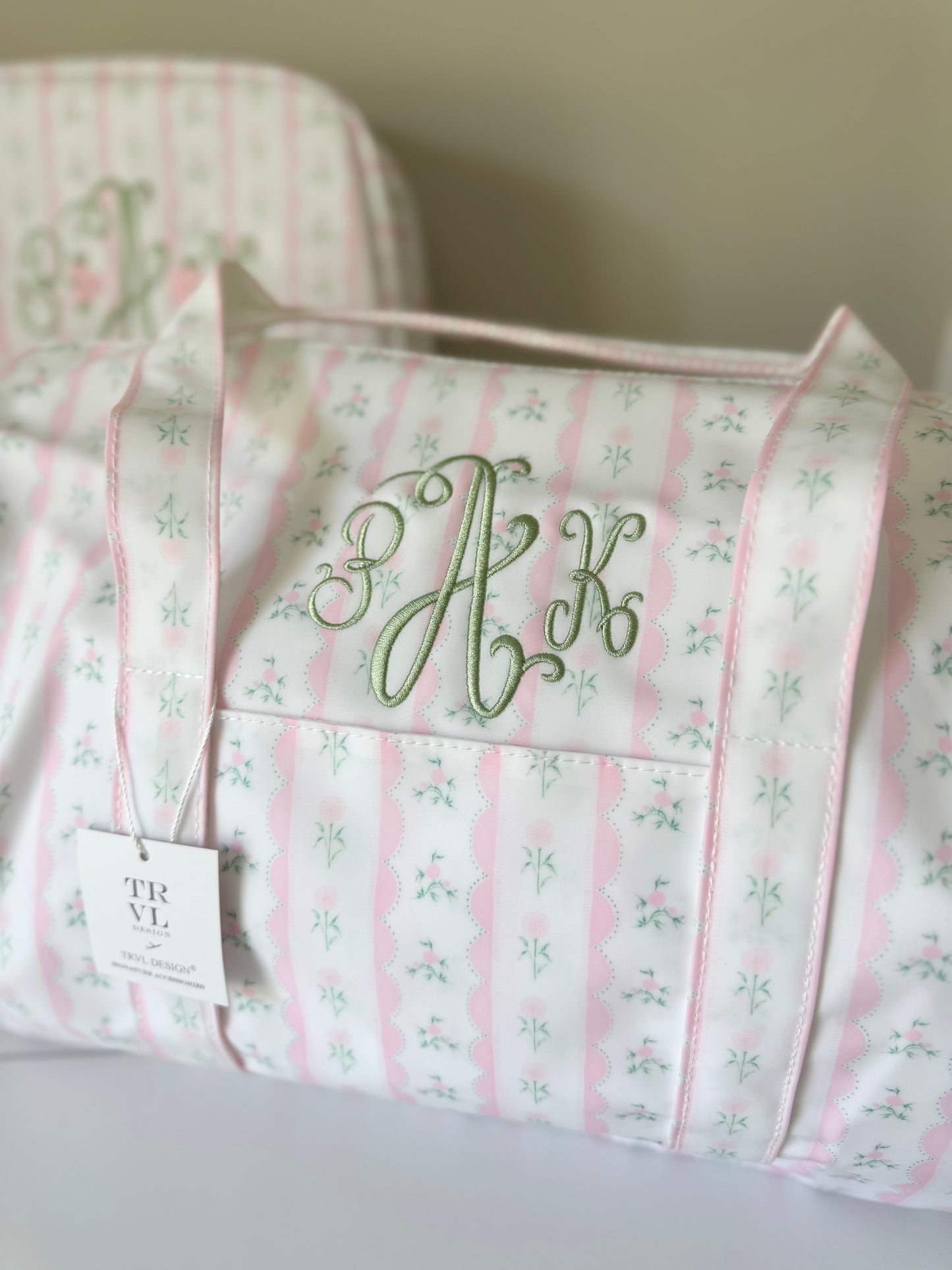 TRVL PINK RIBBON FLORAL WEEKENDER DUFFEL