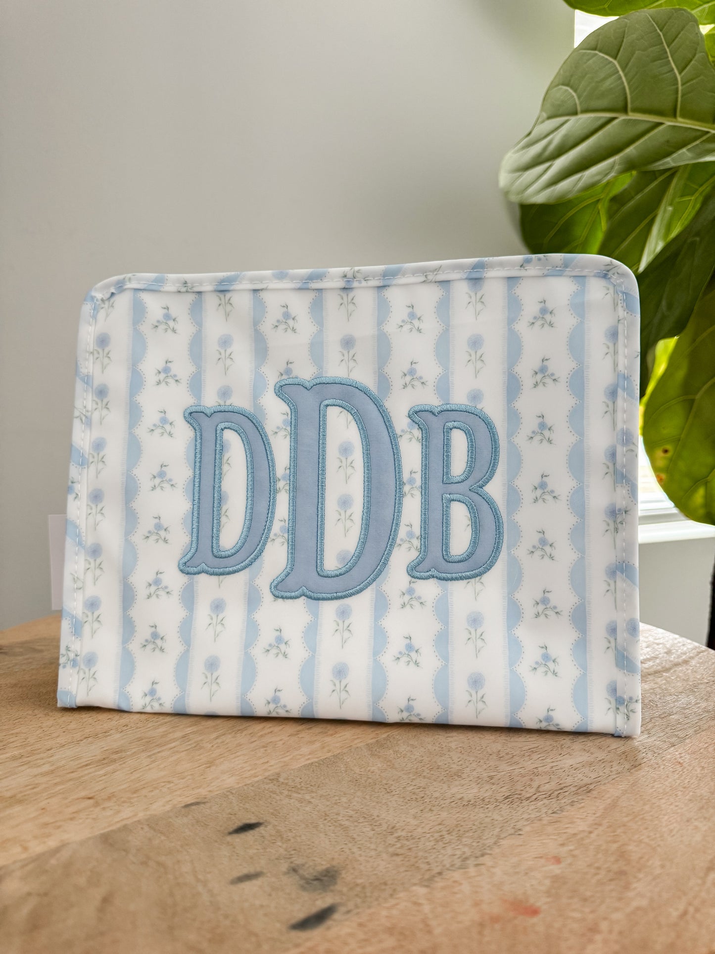 TRVL LARGE BLUE RIBBON FLORAL ROADIE