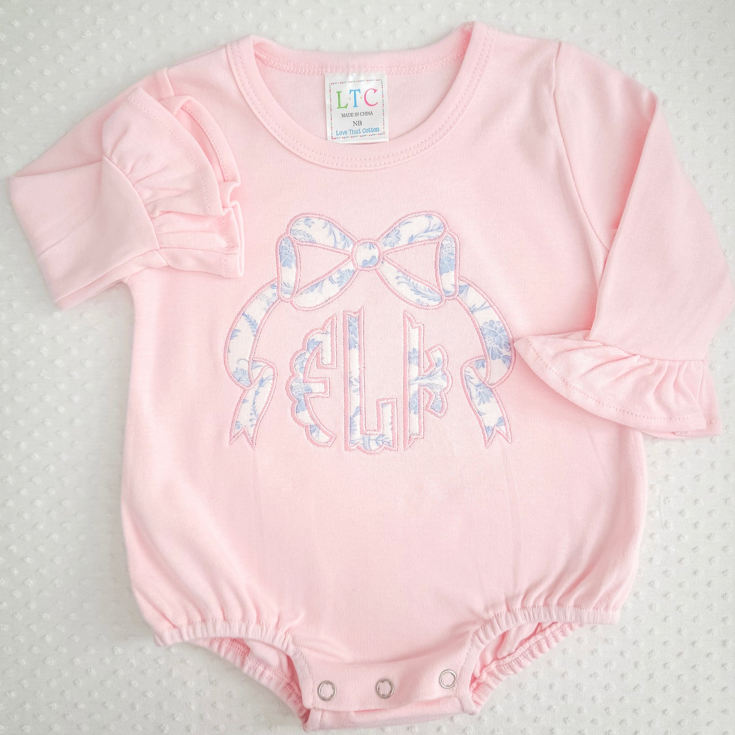 LS Ruffle Appliqué Bow Monogram Bubble