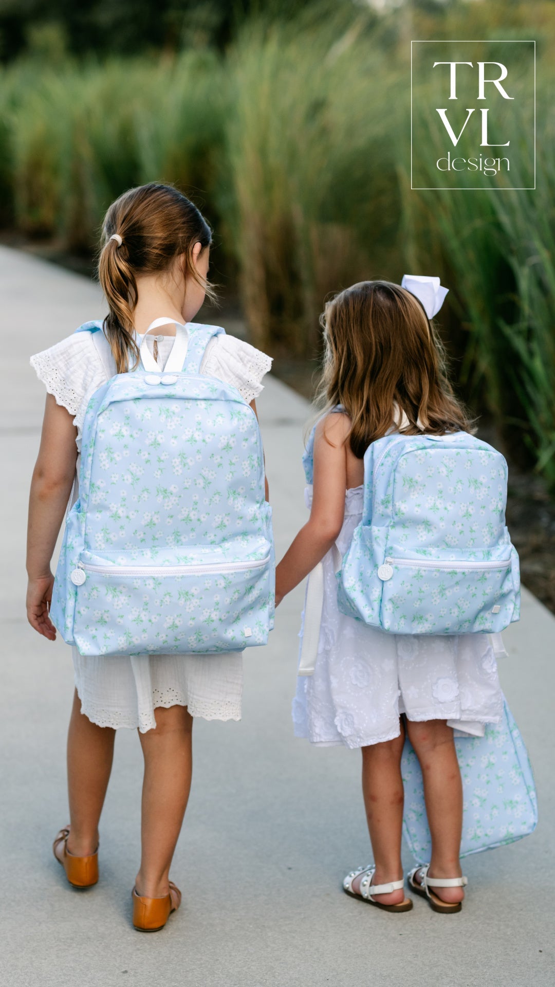 TRVL KIKI FLORAL BACKPACK