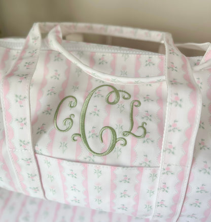 TRVL PINK RIBBON FLORAL WEEKENDER DUFFEL