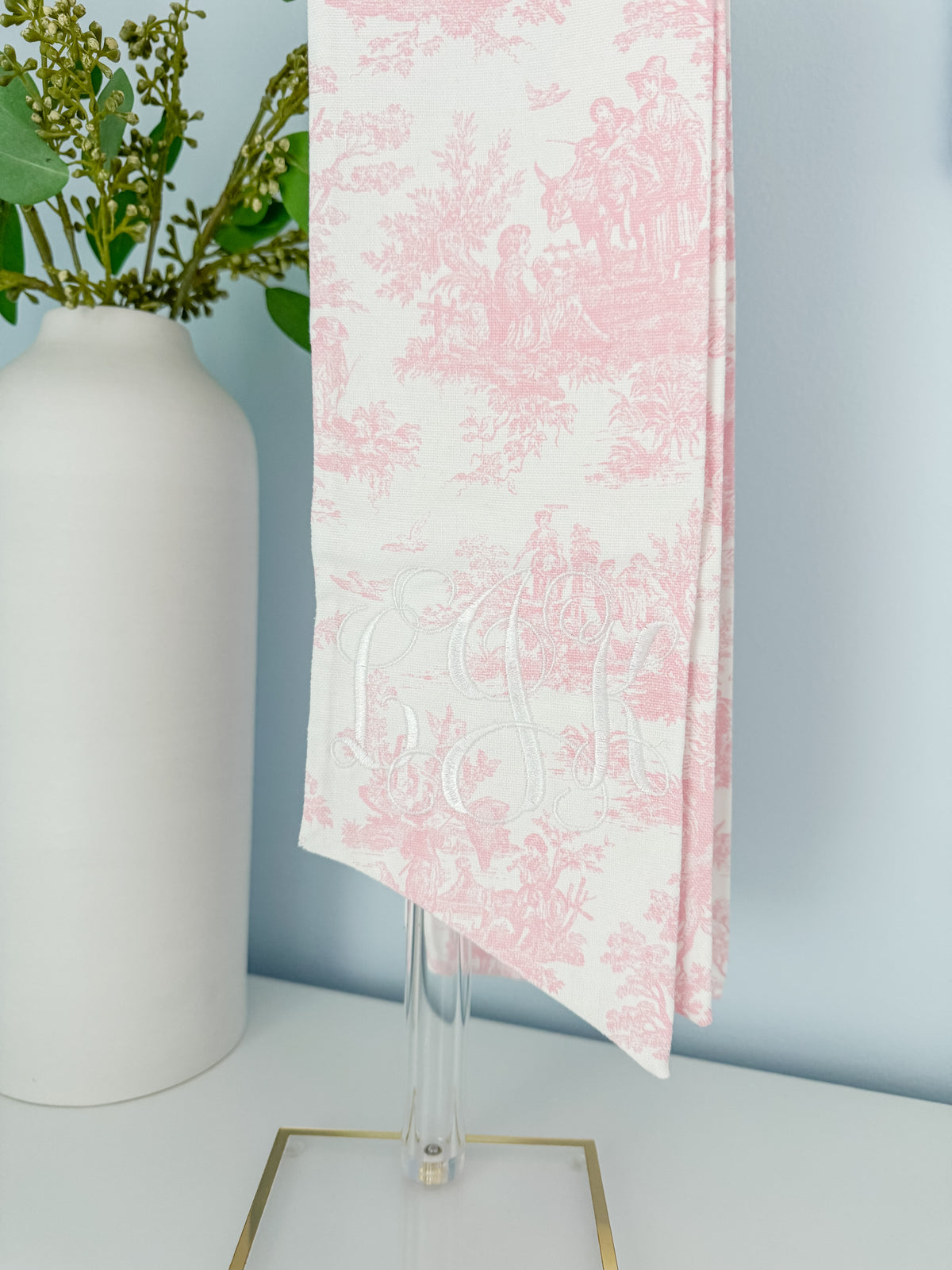 Baby Bow Sash with the initials “LJK” Embroidered