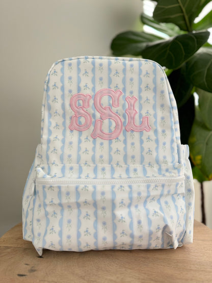 TRVL BLUE RIBBON FLORAL BACKPACK
