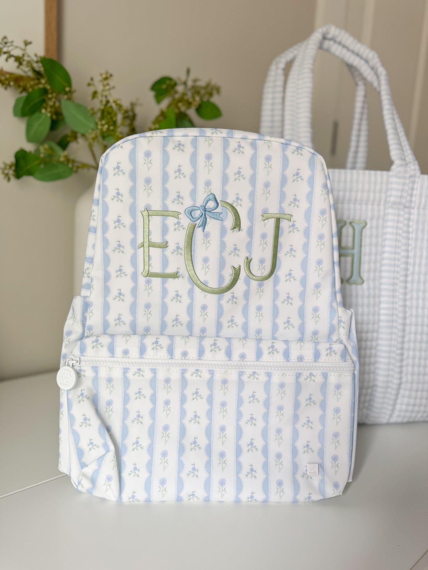 TRVL BLUE RIBBON FLORAL BACKPACK