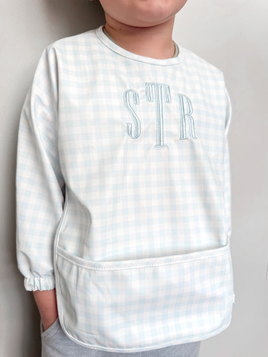 TRVL BLUE GINGHAM LS SMALL BIB